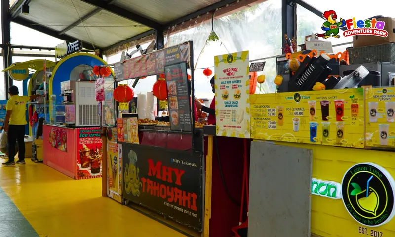 A carnival arcade booth with games and prizes
