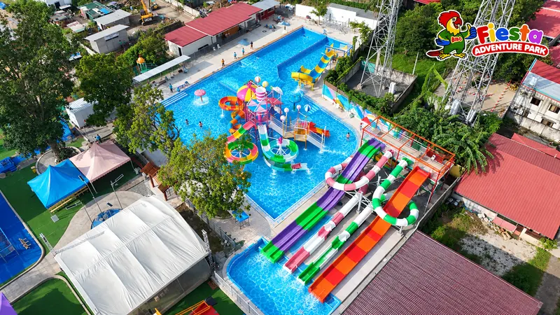Overhead view of the main pool, kids pool and slides
