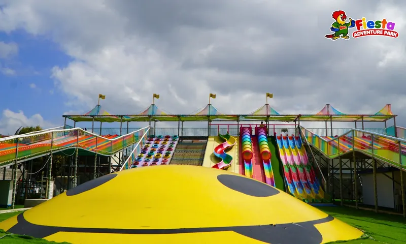 Looking up the rainbow slide hill from the bottom of the lanes