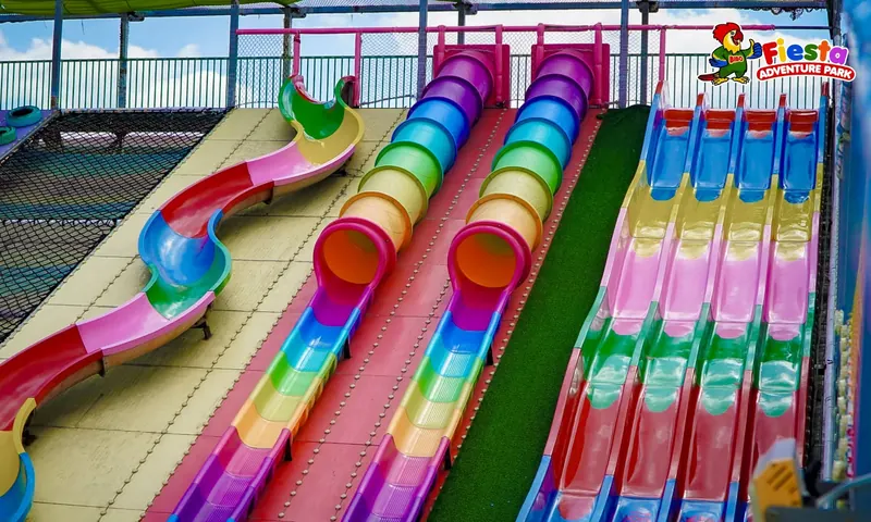 Close view of the striped rainbow slide lanes