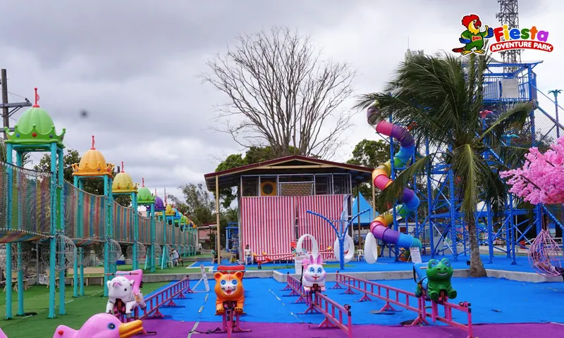 The rainbow tunnel walk with the pink wishing tree in the background
